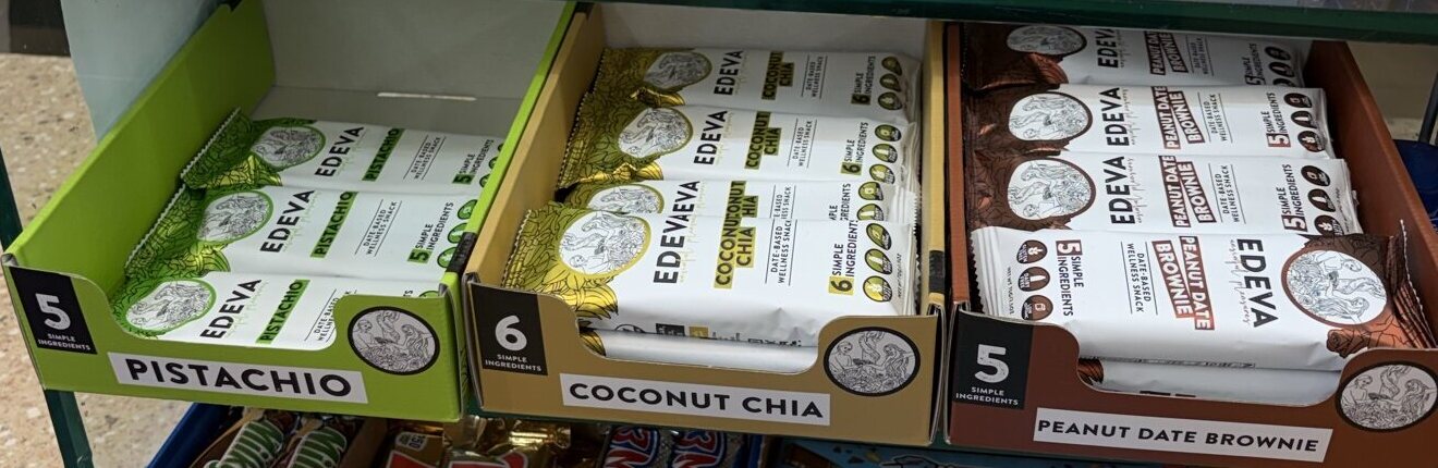 Pistachio, Coconut Chia and Peanut Date Brownie bars in display trays