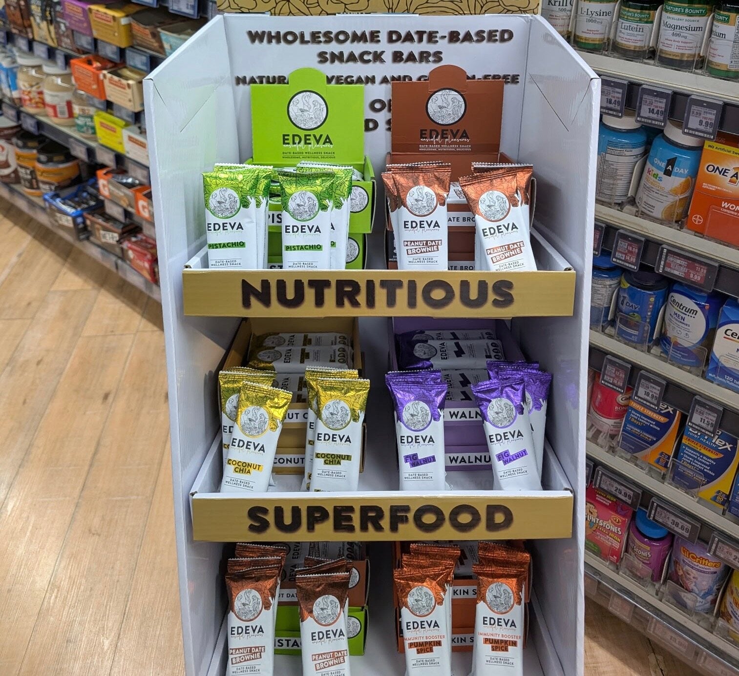 EDEVA date bars in a freestanding display in a store aisle